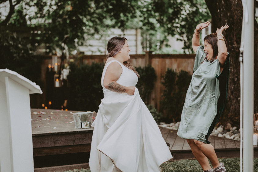 Dancing bride and mom